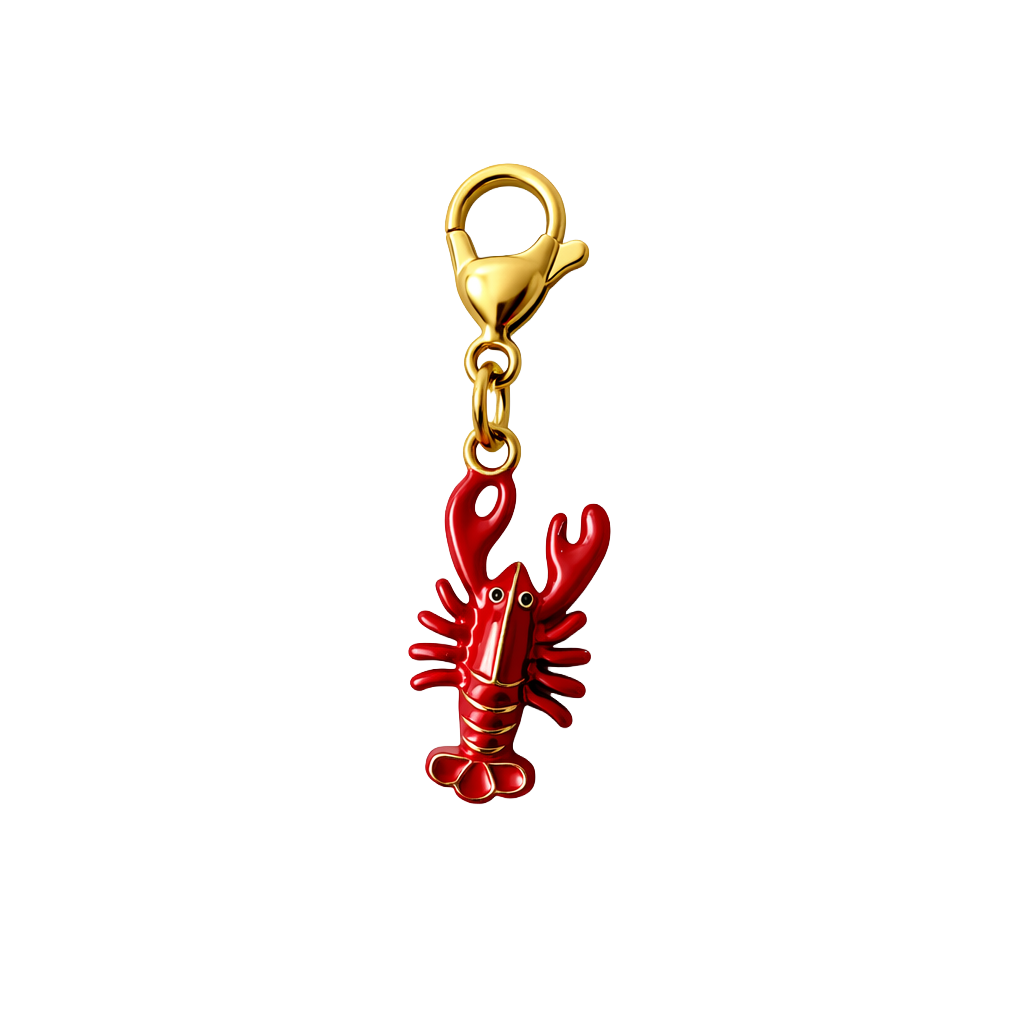 Red lobster charm with gold clasp on a white background