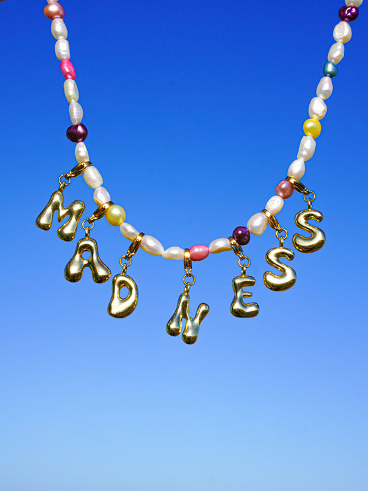 pearl necklace with gold letters charms