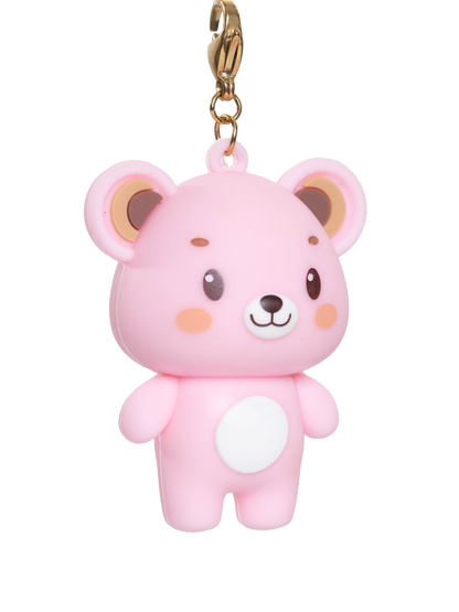 Pink bear-shaped pendant on a  gold clasp and a white background