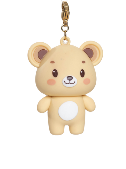 Yellow teddy bear-shaped pendant on a white background