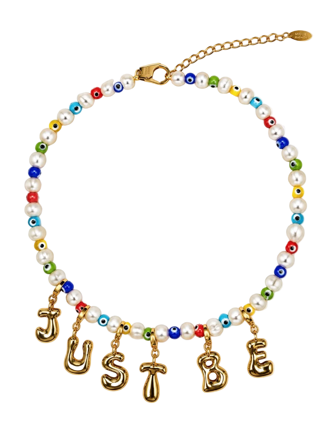 A beaded MILLIE MADNESS necklace with white pearl-like beads, colorful evil eye accents, and gold letter charms spelling 'JUST BE' on a white background.