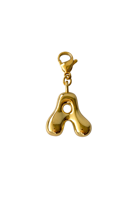 Gold letter 'A' charm on a white background