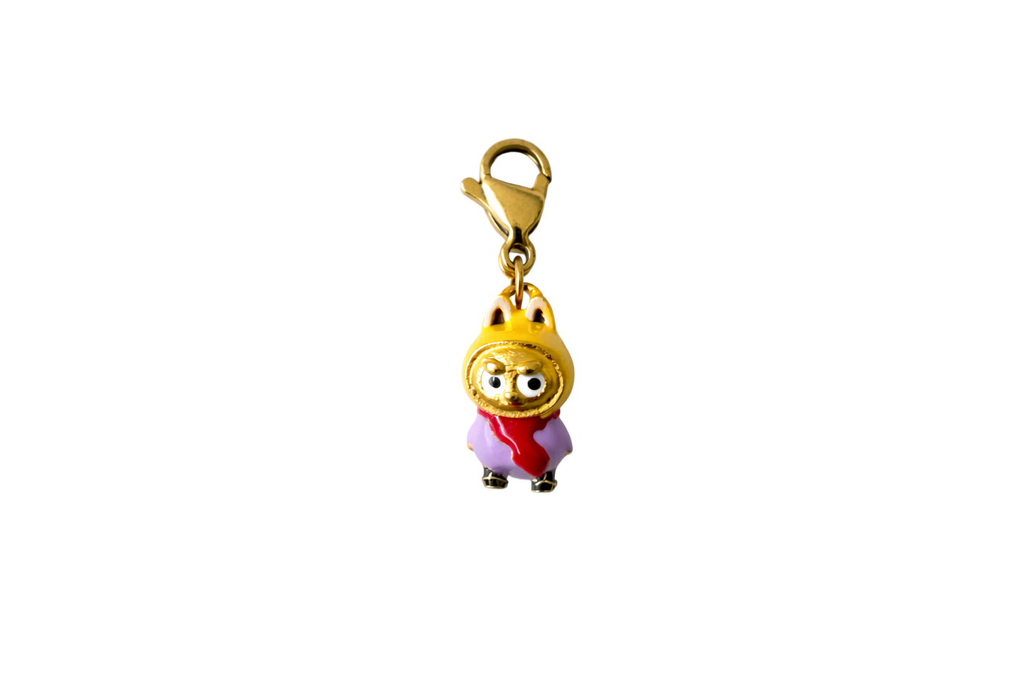 Gold labubu charm with a cartoon character wearing a red dress and gold crown on a white background