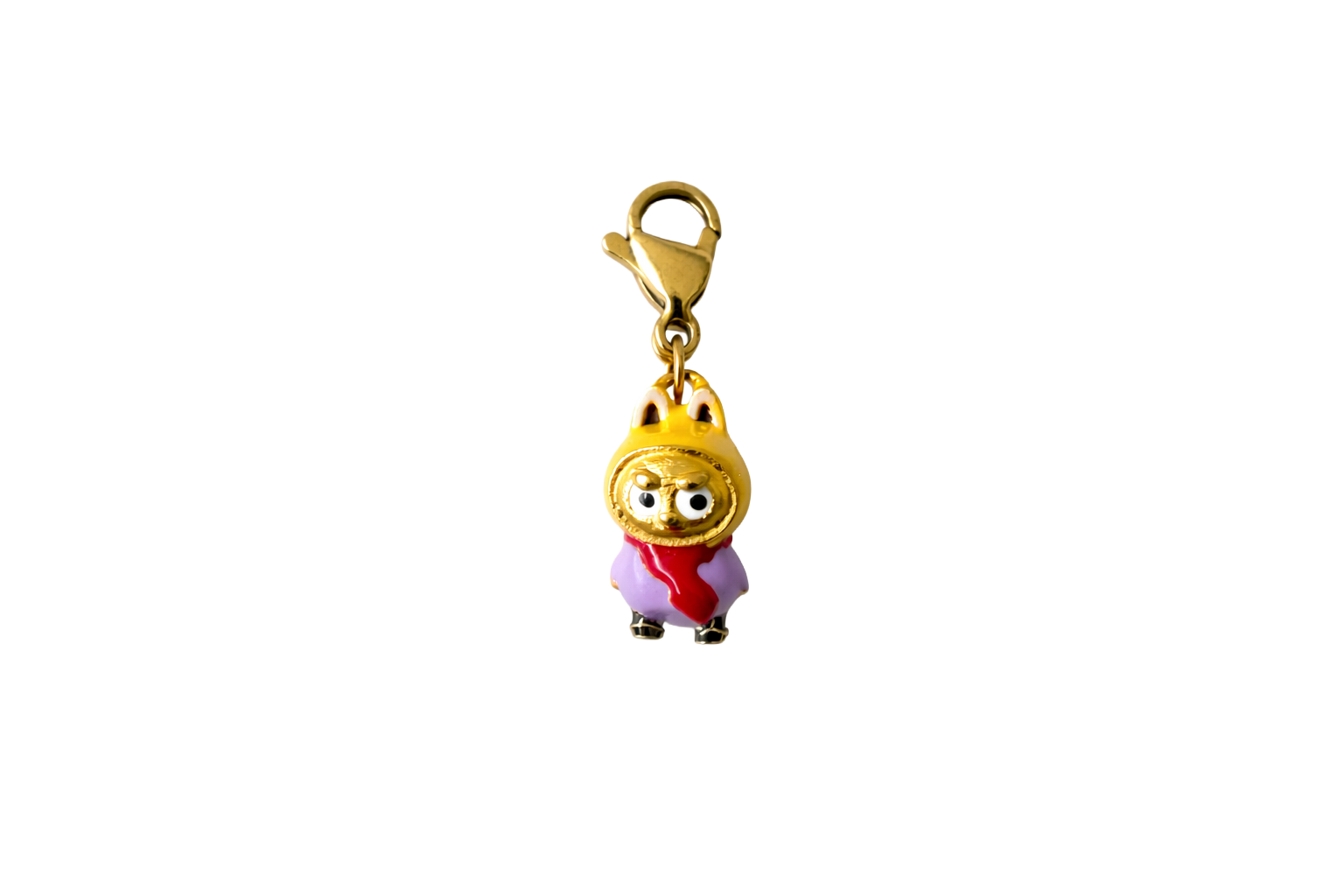 Gold labubu charm with a cartoon character wearing a red dress and gold crown on a white background