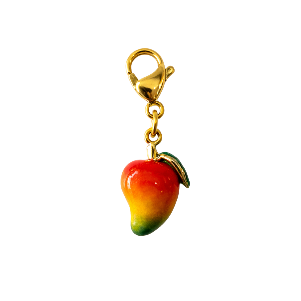 Mango-shaped charm with gold clasp on a white background