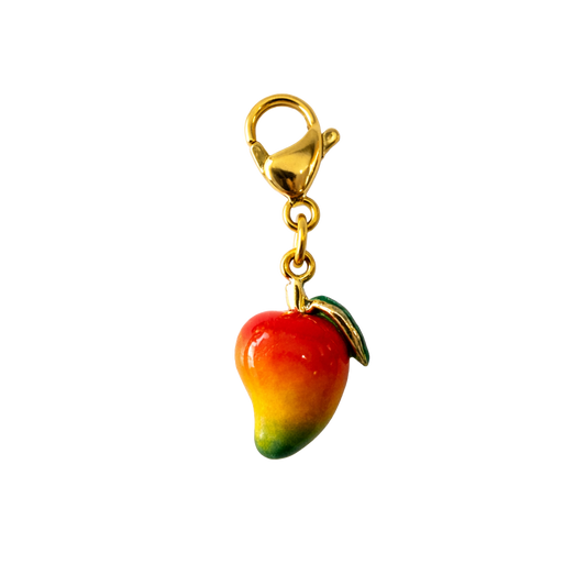 Mango-shaped charm with gold clasp on a white background
