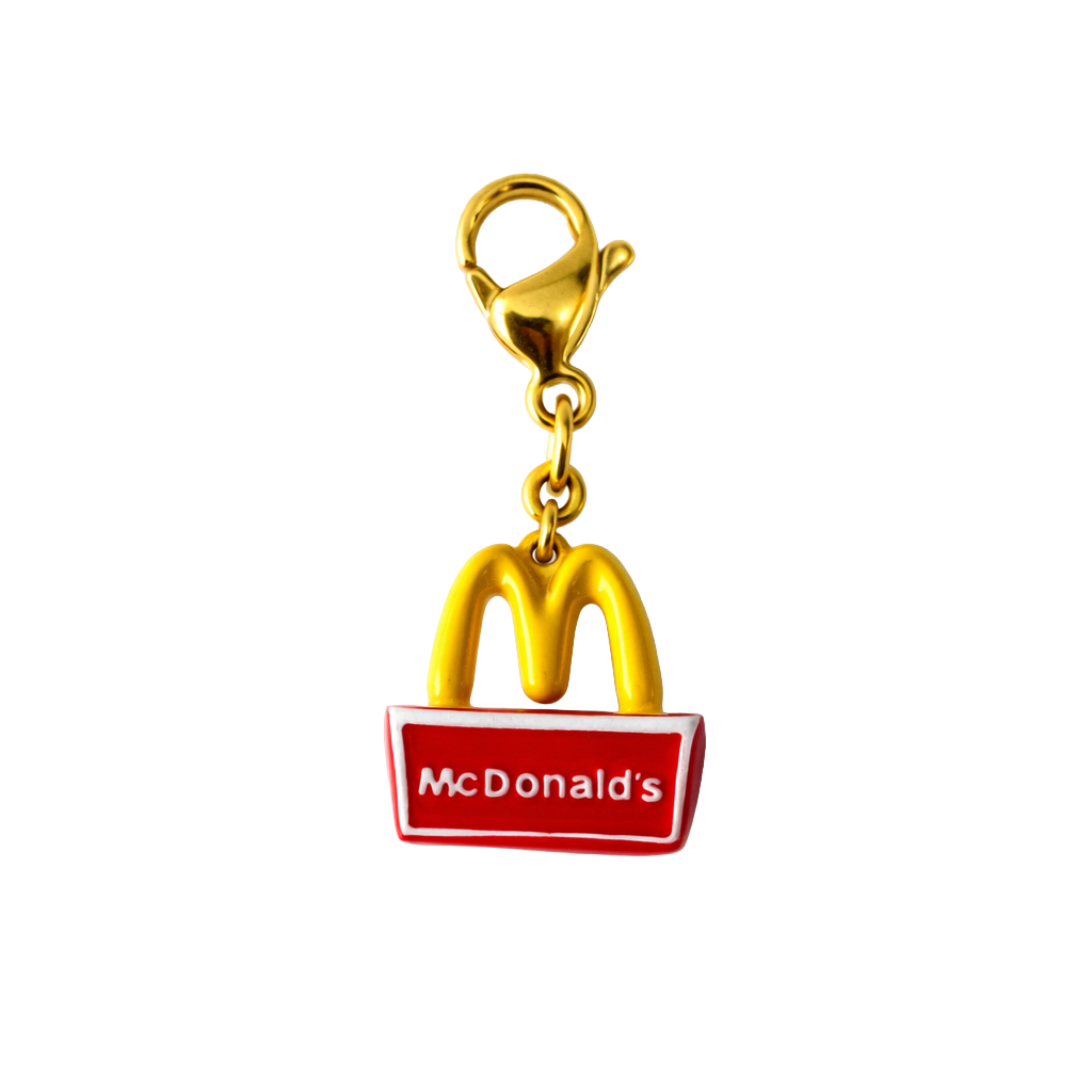 Gold McDonald's logo charm on a white background