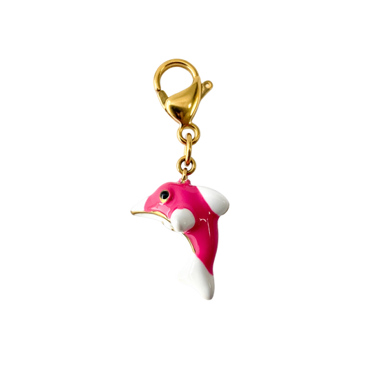 Pink and white dolfin charm with gold clasp on a white background