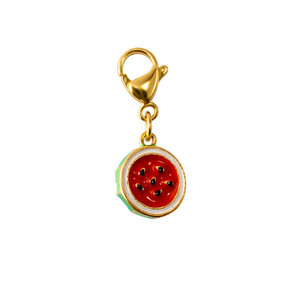 Gold charm with a watermelon design on a white background
