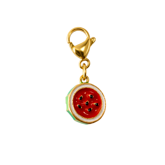 Gold charm with a watermelon design on a white background