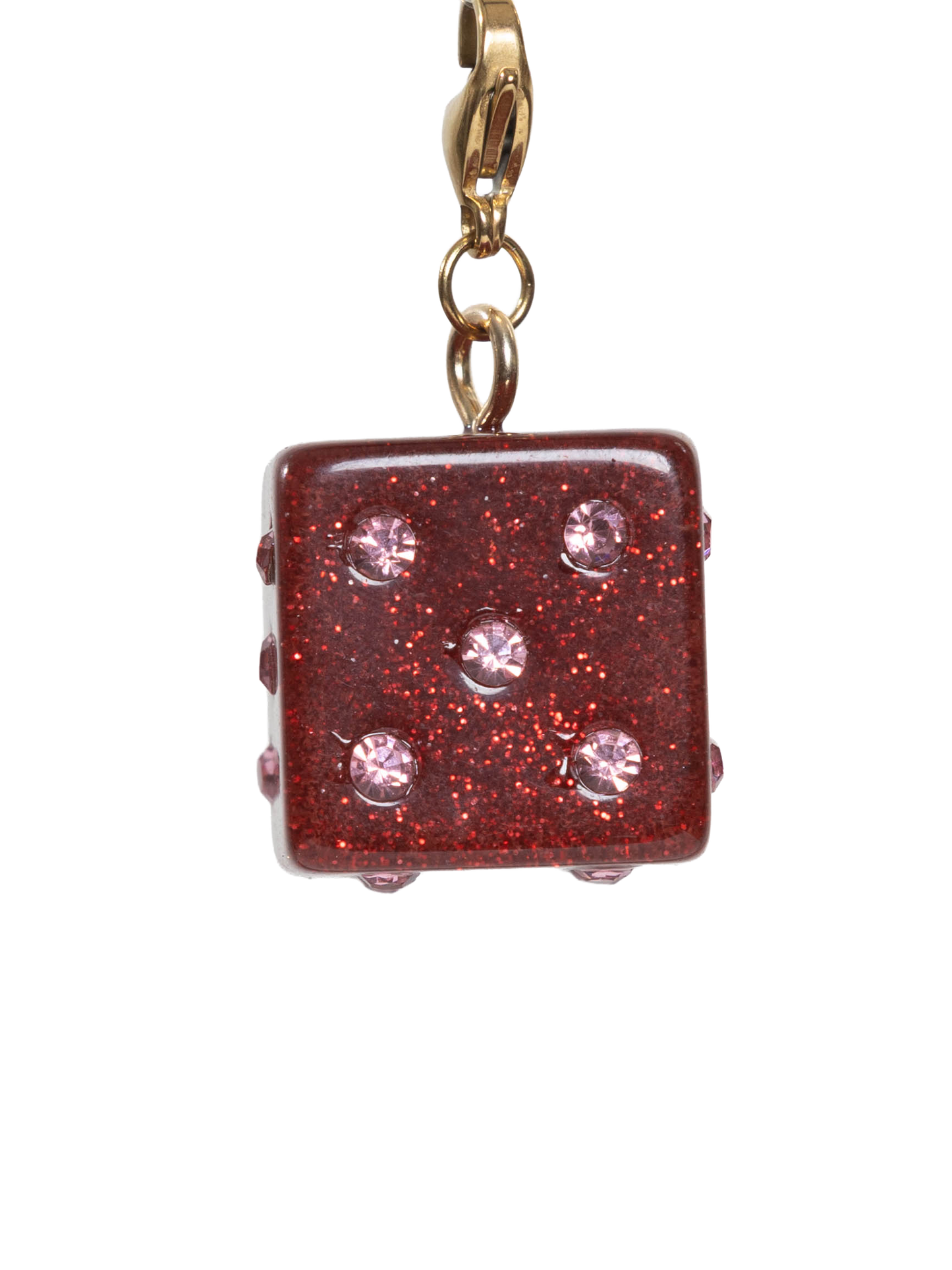 Red glittery charm with gold clasp on a white background