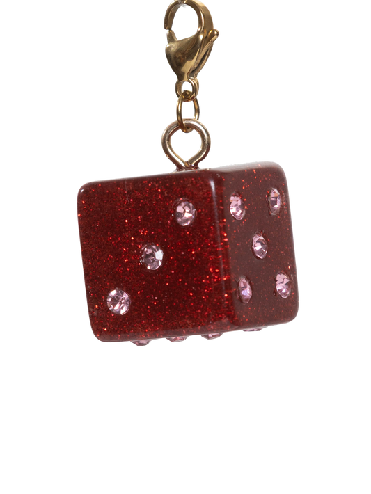 Red glittery dice charm with gold clasp on a white background