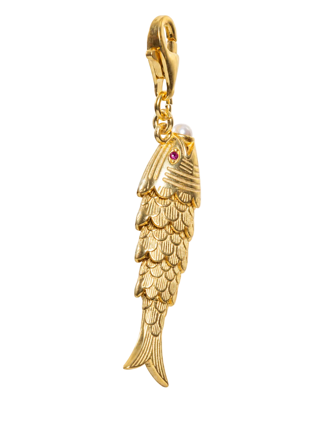 A gold fish-shaped charm pendant with a lobster clasp, featuring a small red gemstone for an eye and a white pearl for a mouth, shown against a plain white background.