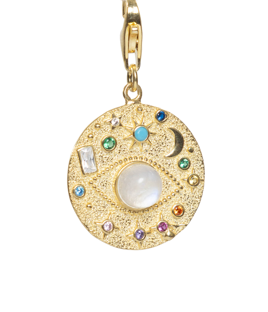 Gold pendant with colorful stones on a white background