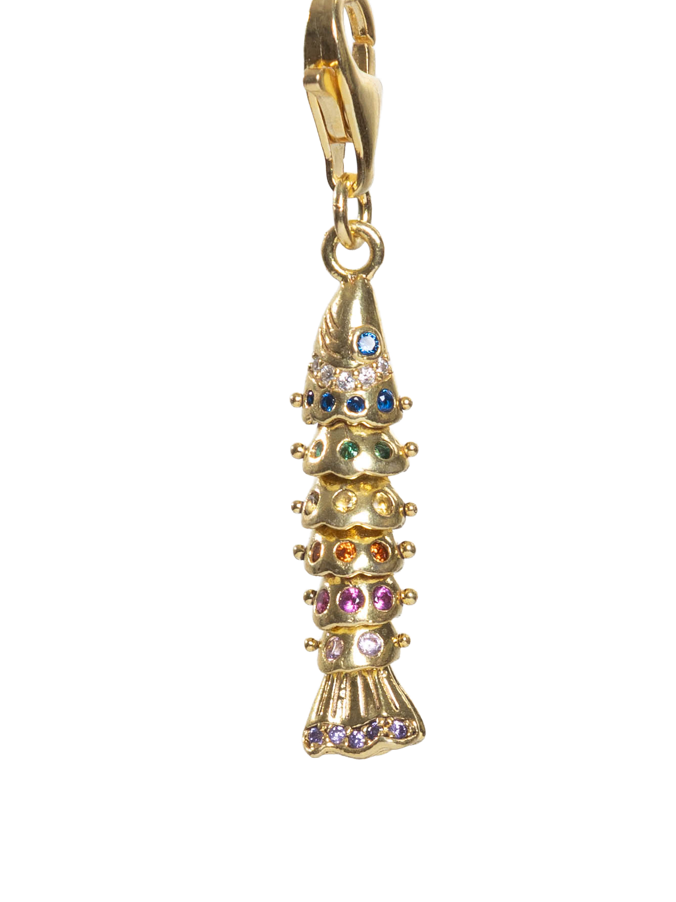 Gold fish charm with colorful stones on a white background