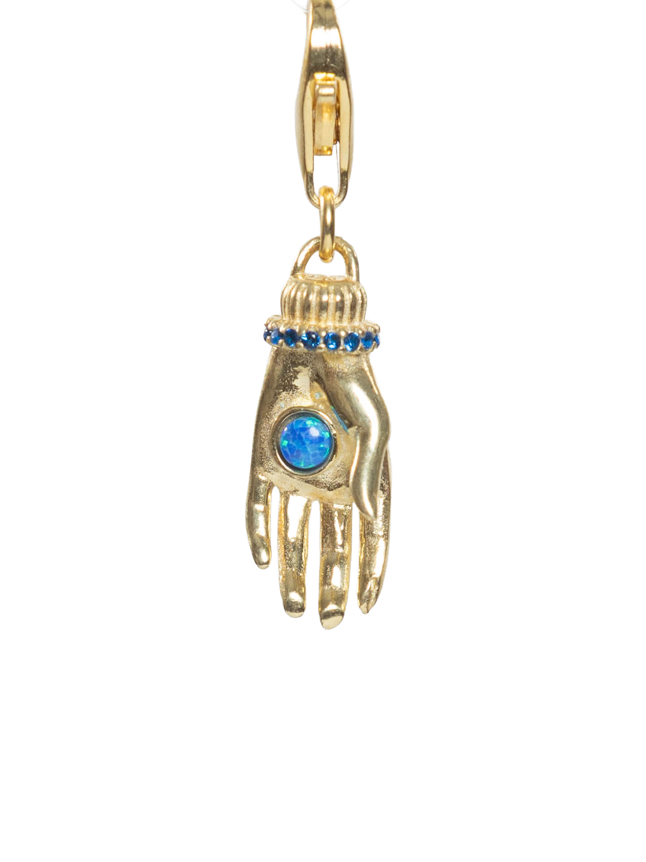 Gold charm shaped like a hand with a blue gem on a white background