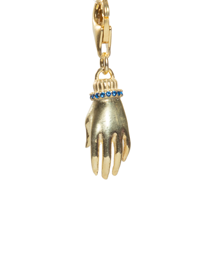 Hand-shaped pendant with gold and blue accents on a white background