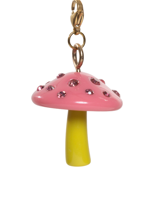 Pink mushroom-shaped ornament with a green stem on gold stainless steel clasp and a white background
