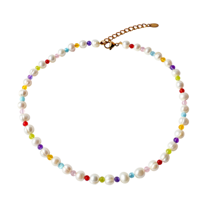Necklace with pearls and multicolored beads on a white background