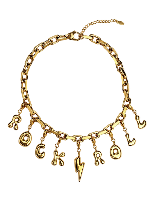 A gold-tone chunky chain millie madness necklace with dangling letter and lightning-bolt charms spelling 'ROCK ROAR' on a plain white background.