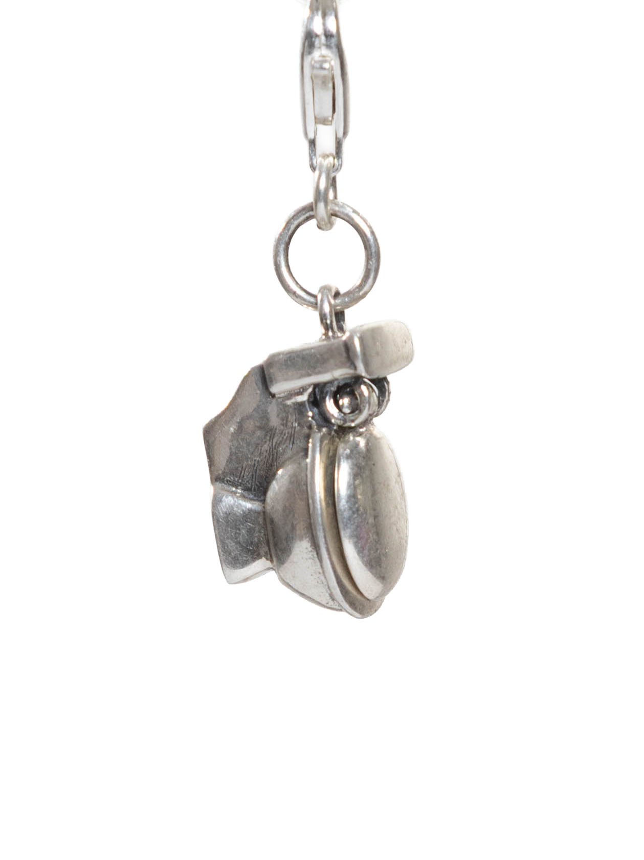 Silver toilet pendant with a pendant on a white background