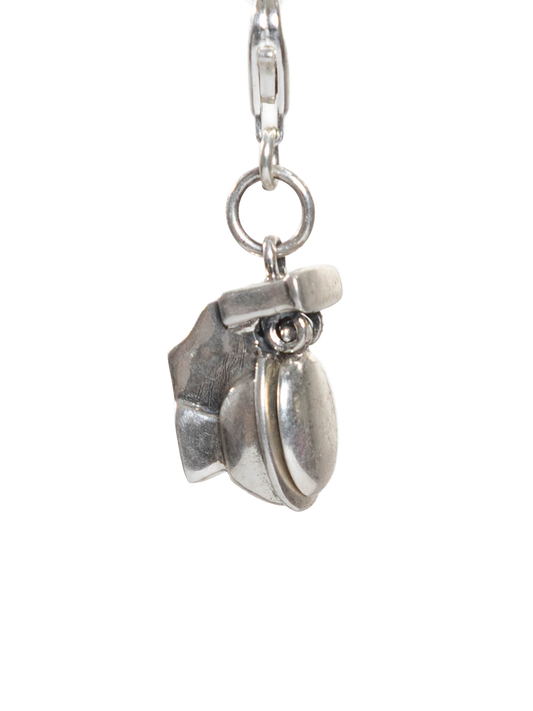 Silver toilet pendant with a pendant on a white background