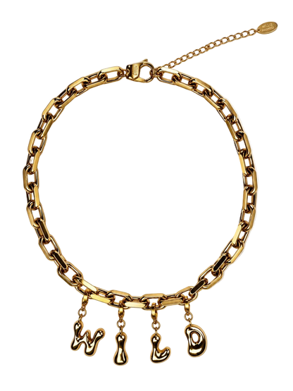 Gold-tone chunky chain millie madness necklace with dangling stylized letter charms on a white background.
