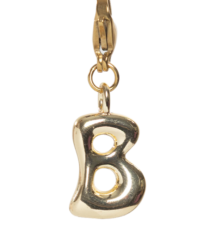 Gold charm with letter 'B' on a white background