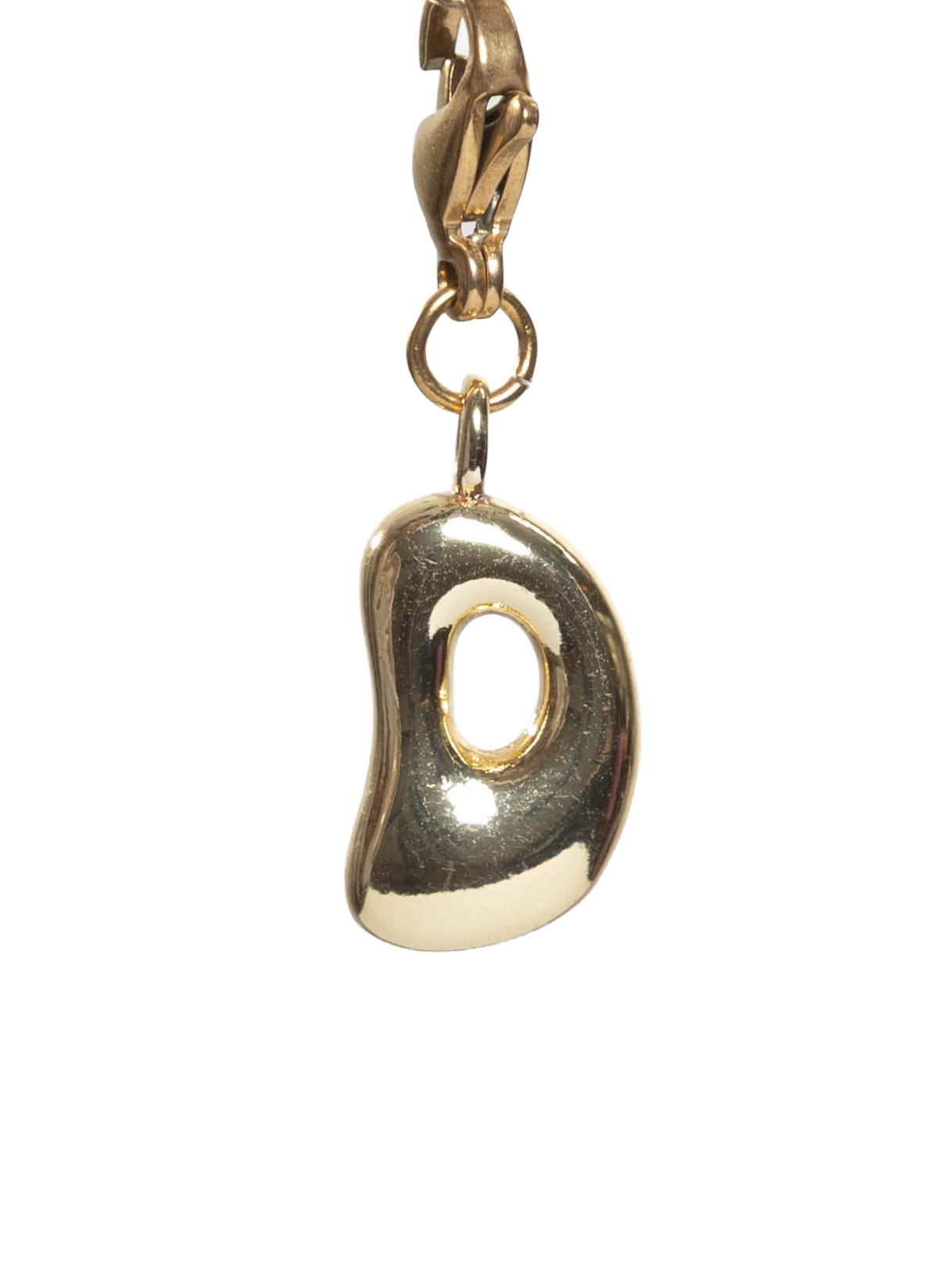 Gold pendant on a white background