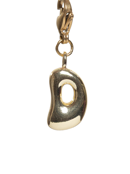 Gold pendant on a white background