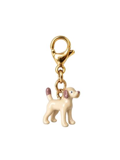 A gold-tone lobster clasp keychain charm shaped like a small cream-colored puppy with pink-tipped ears and tail, shown on a plain white background.