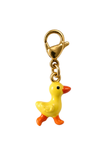 A small yellow duck charm with orange beak and feet, attached to a gold lobster clasp, shown on a plain white background.