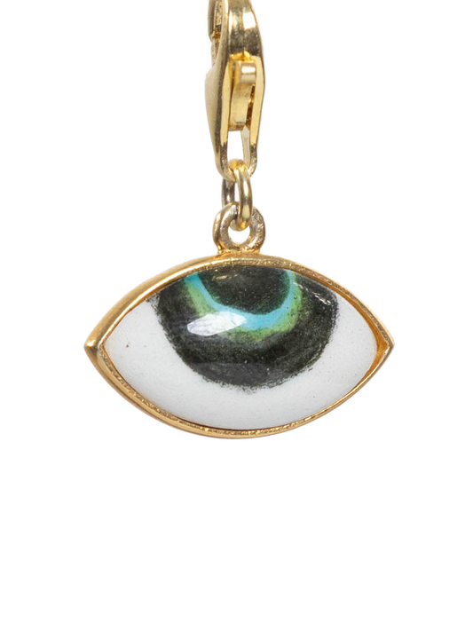 Eye-shaped pendant charm on a white background