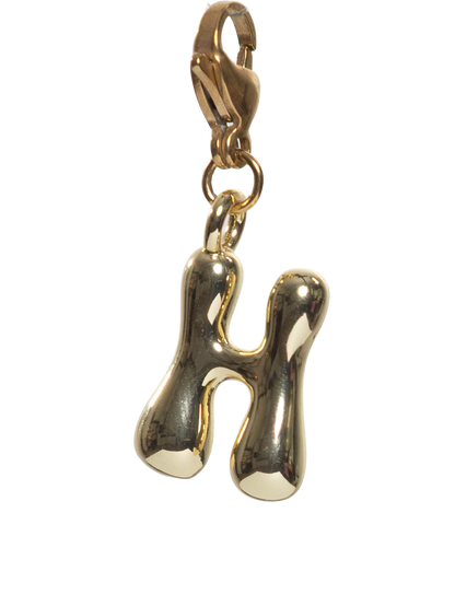 Gold plated letter H charm stainless steel clasp on a white background