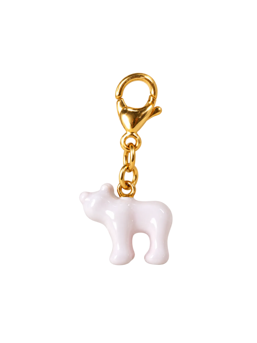 A small glossy white cow charm with a gold-tone lobster clasp and chain, isolated on a white background.