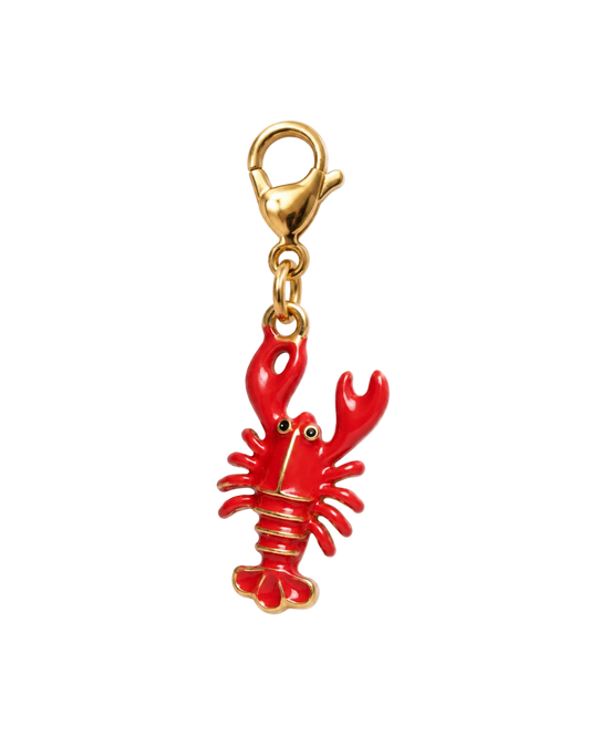 A millie madness lobster charm with bright red enamel and gold-tone metal details, attached to a gold lobster clasp, shown on a plain white background.