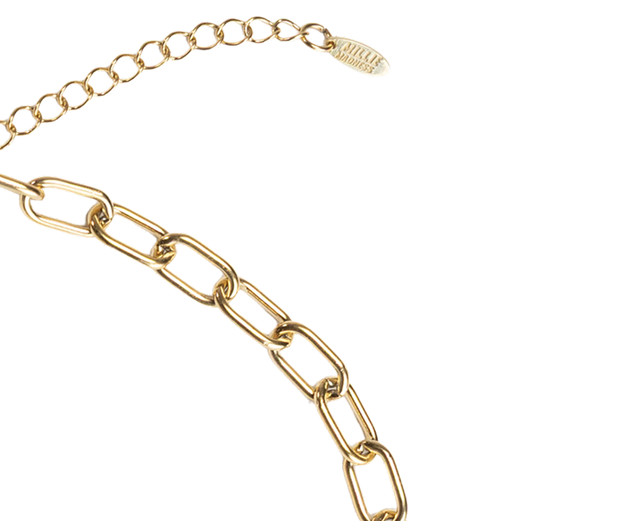 Gold chain necklace on a white background