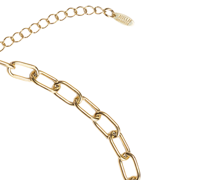 Gold chain necklace on a white background