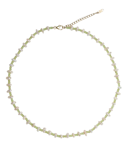 Delicate necklace with small beads on a white background