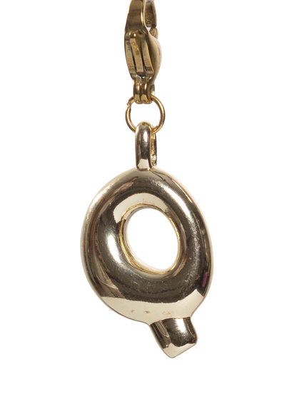 Gold plated letter Q charm stainless steel clasp on a white background