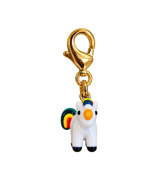 A white enamel-style unicorn charm with a rainbow-colored mane and tail, black hooves, and a shiny gold lobster clasp attached at the top, shown on a plain white background.