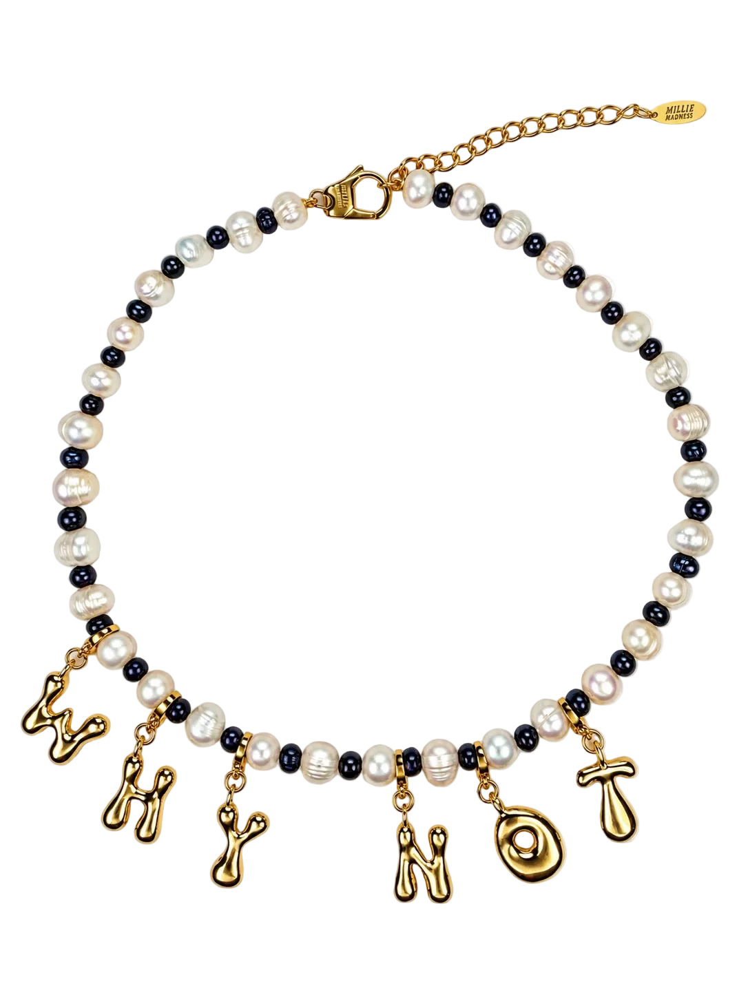 A MILLIE MADNESS necklace featuring white baroque pearls and small black pearls, with dangling gold charms shaped like letters and symbols, shown on a plain white background