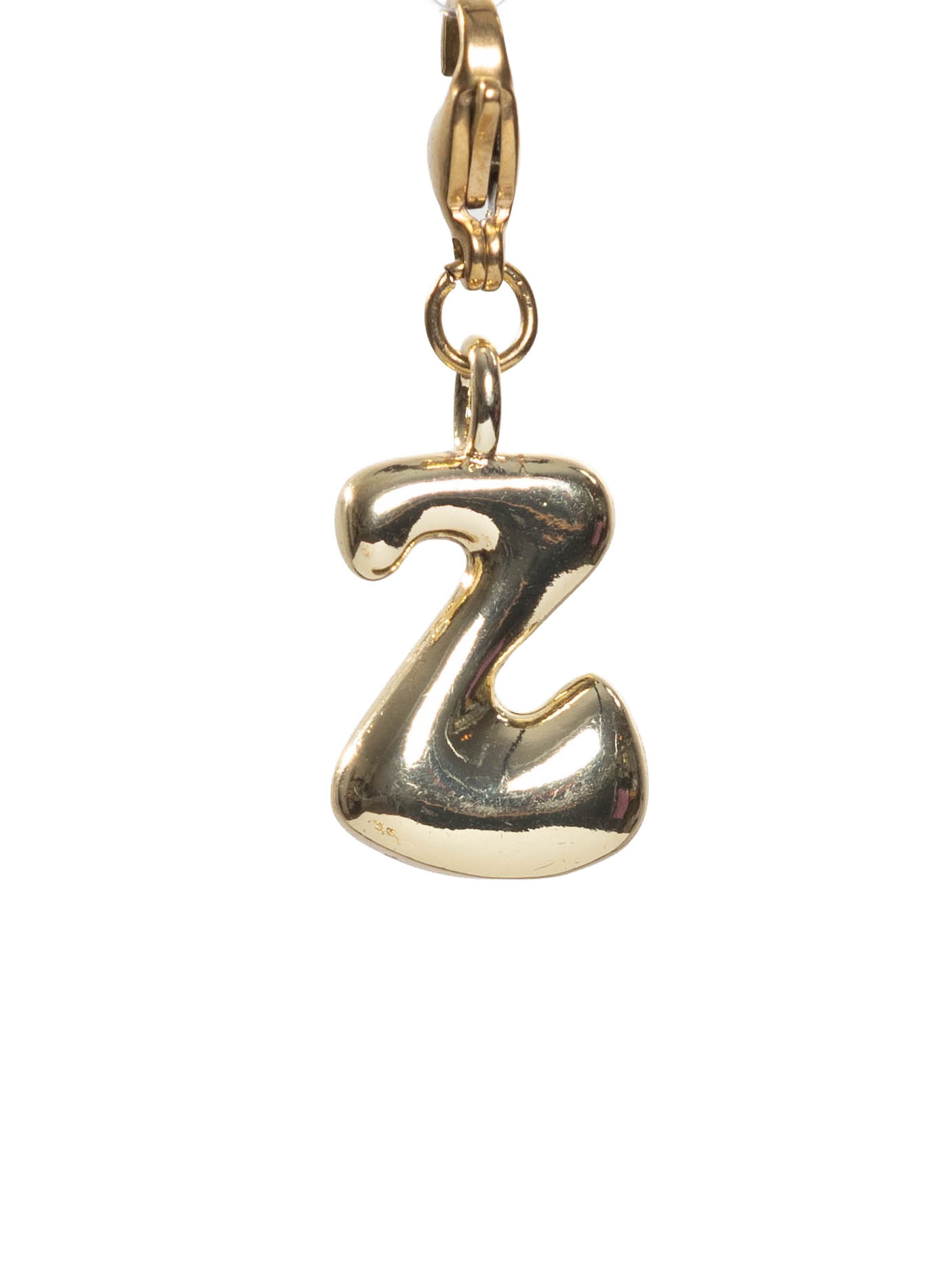 Gold charm with letter 'Z' on a white background